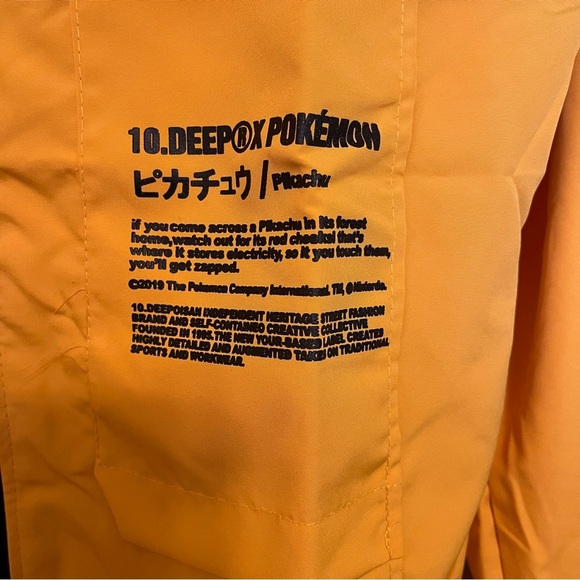 Nike 10 Deep X Pokemon Pikachu Trainer Yellow Windbreaker Jacket Medium - Picture 4 of 13